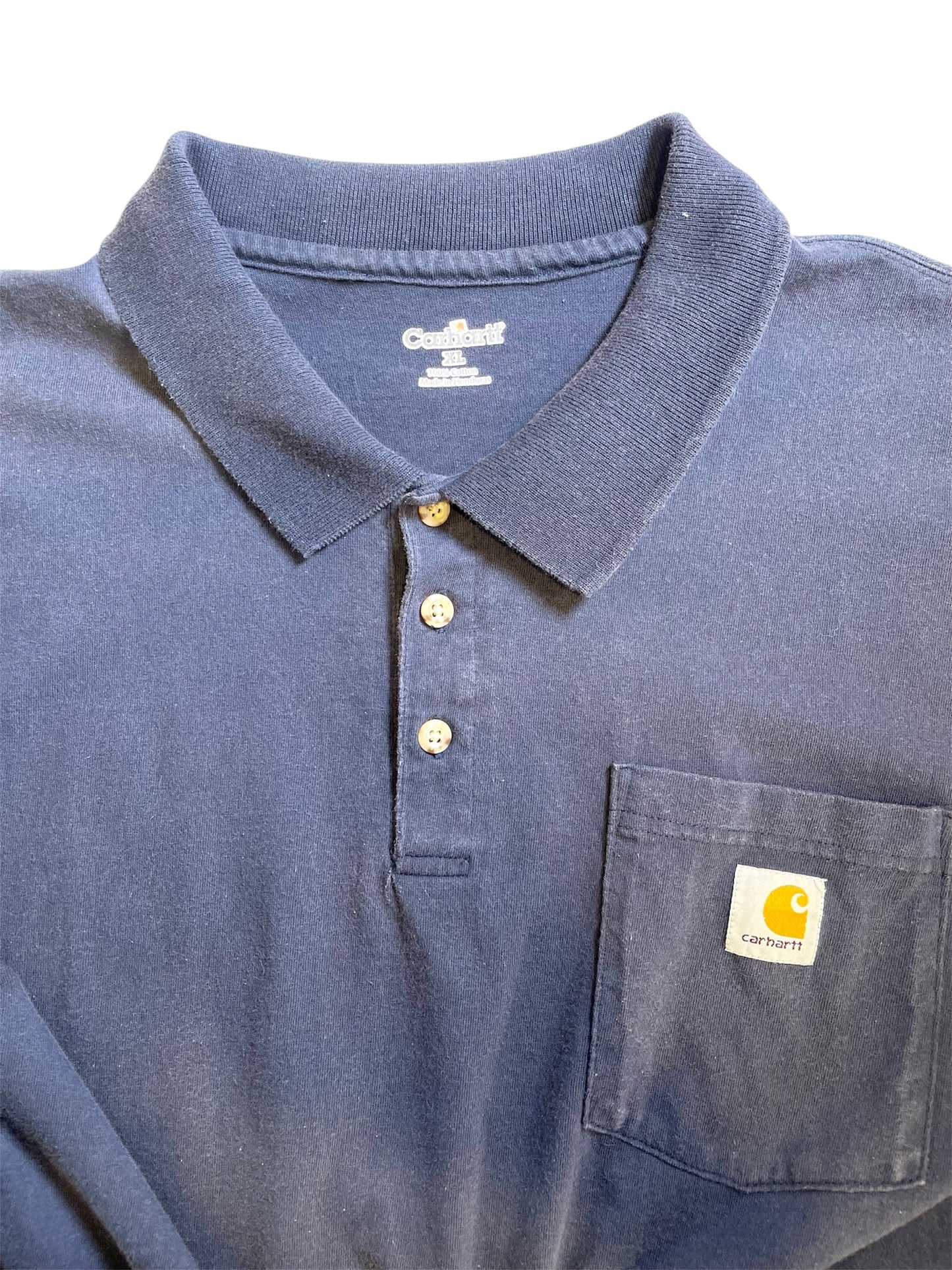 【carhartt】ネイビーブルーのポロシャツ